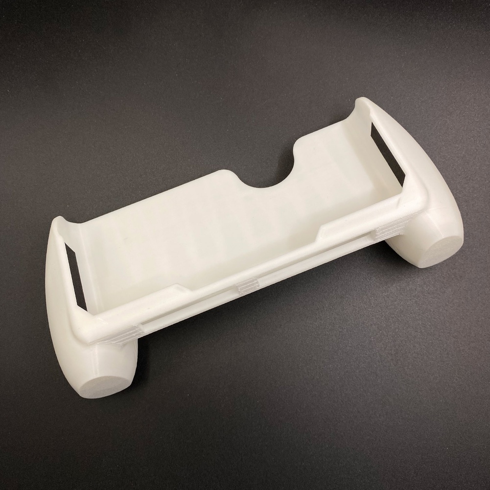 Stylowe, jednokolorowe etui z  – Gaming Console Handle recenzja i cena